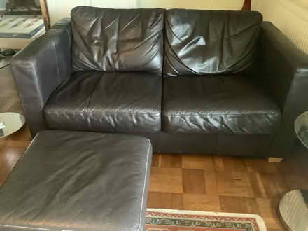 Photo of free Brown leather sofa + footstool (Tonedale) #4