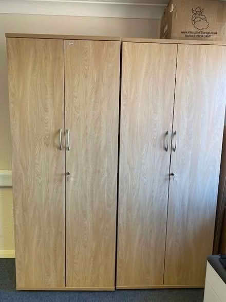 Photo of free 2 x Tall Lockable Cupboard (Eaton Ford PE19) #1