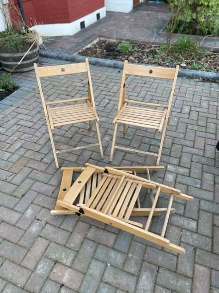 Photo of free Four wooden folding chairs (Near Boston Manor tube station) #1