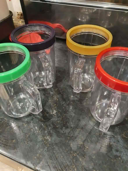 Photo of free 4 new plastic cups (AB32) #1