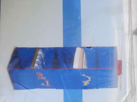 Photo of free Tesco blue children's hanging clothes shelves (Southbourne BH6) #2