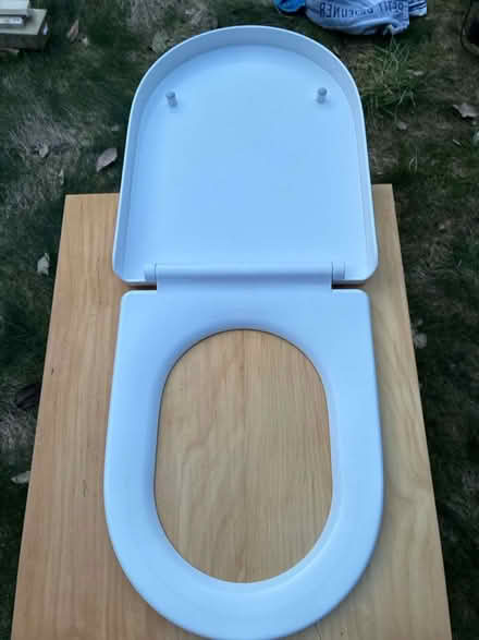 Photo of free Plastic Toilet Seat - Unused with fittings (The Camp AL1) #1
