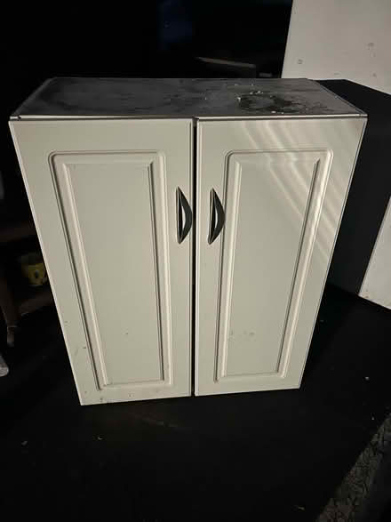 Photo of free 2-door white storage cabinet (Valencia Avenue, Sunnyvale) #1