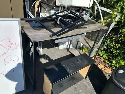 Photo of free Wooden desk with side shelves (Valencia Avenue, Sunnyvale) #1