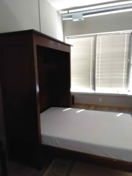 Photo of free Dark wood murphy bed full size (Uptown) #1