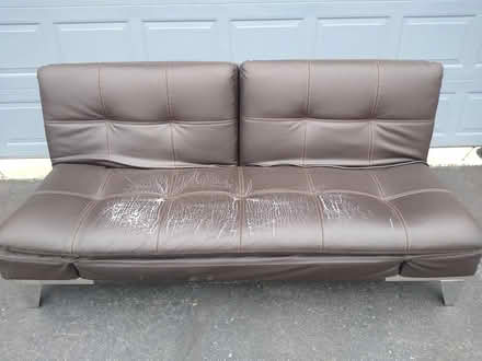 Photo of free Leather couch - Costco (S. of 11 mile, off orchard lk) #1