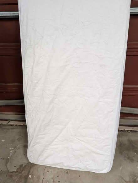 Photo of free Crib mattress and covers (Big Trees park) #1