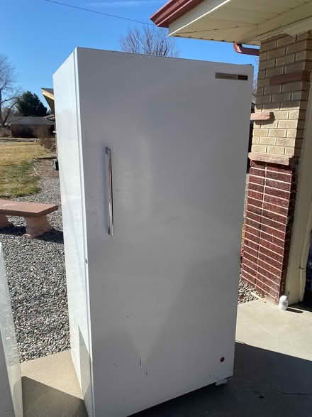 Photo of free Stand up freezer (885 S. Estes st. Lakewood, CO) #1