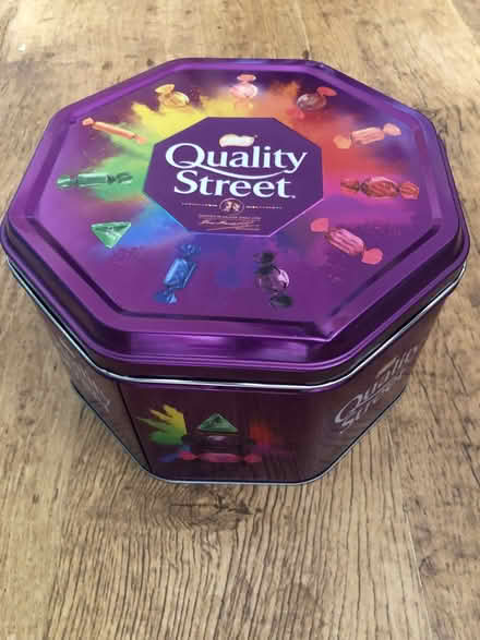 Photo of free Big metal Quality Street tin (Freehold LA1) #1