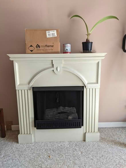 Photo of free gel fuel fireplace w/8 cans of fuel (Near RT 25 and 68) #1