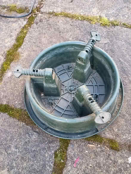 Photo of free Christmas tree stand (green) (Twickenham TW1) #1