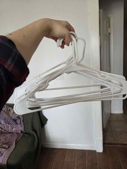 Photo of free White plastic hangers (Bayonne, NJ) #1