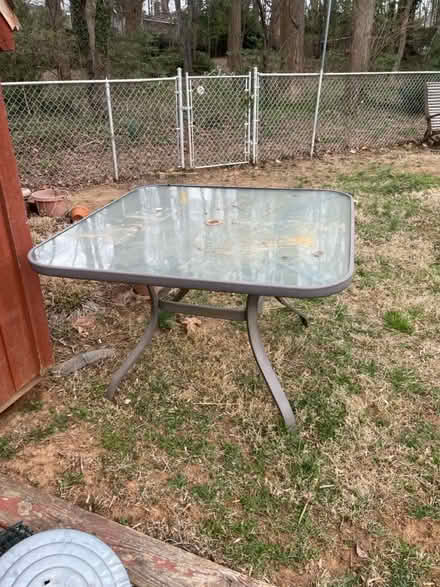 Photo of free Outdoor glass topped table (Fairfax City) #1