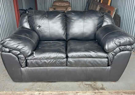 Photo of free Black leather loveseat sofa (Howell) #1