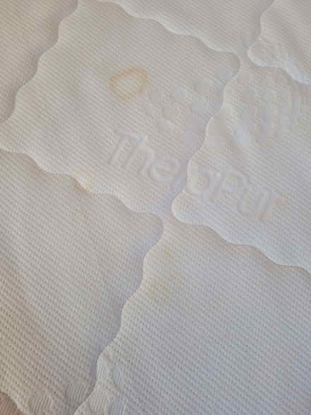 Photo of free Double mattress, 8 Yr old guest bed coffee stains (Butterow GL5) #1
