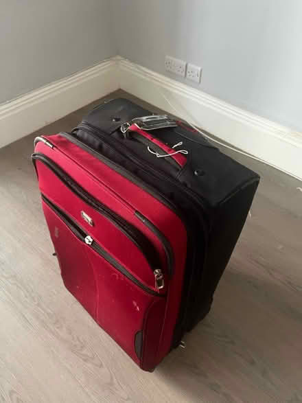 Photo of free Large wheeled suitcase - red (HA8 / Edgware) #1