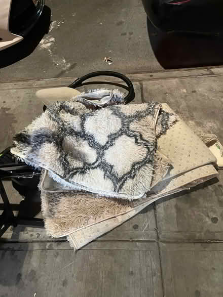 Photo of free Curb alert: Rugs and white chair (Upper East Side) #1