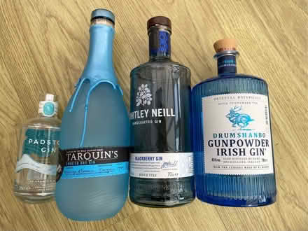 Photo of free 4 blue glass empty decorative gin bottles (Abbotswood GL3) #1