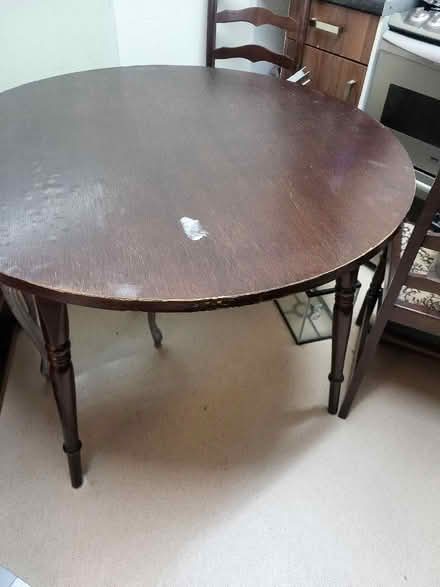 Photo of free Dark brown wooden dining table with four matching chairs (West Drayton UB7) #1