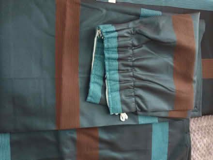Photo of free Dark teal curtains with brown and teal stripes (Lakenheath IP27) #1
