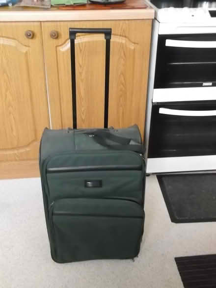 Photo of free A dark green travel suitcase (Walton) #1