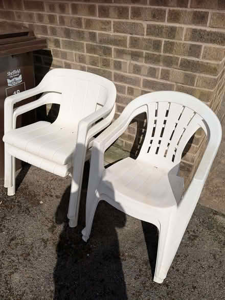 Photo of free White plastic garden chairs (Mosborough S20) #1