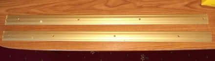 Photo of free Gripper for doorways - gold colour (Woodley RG6) #1
