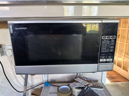 Photo of free Tatty Microwave, working.. (Common Edge FY4) #2