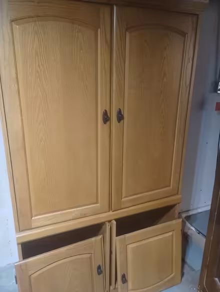 Photo of free Wardrobe and entertainment center (93rd and Antioch 913-980-0411) #2