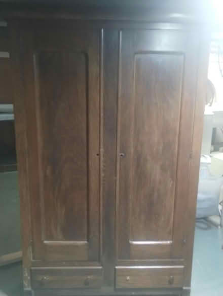 Photo of free Wardrobe and entertainment center (93rd and Antioch 913-980-0411) #1