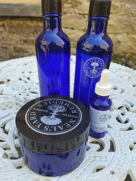 Photo of free Empty Neals Yard Blue Glass Bottles (Box GL6) #1