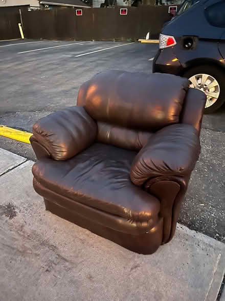 Photo of free Leather brown loveseat (Weston Road & Lawrence Ave Wes) #1