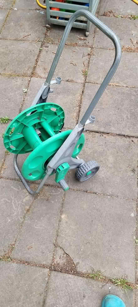 Photo of free Garden hose winder trolley thing (Ilford) #1