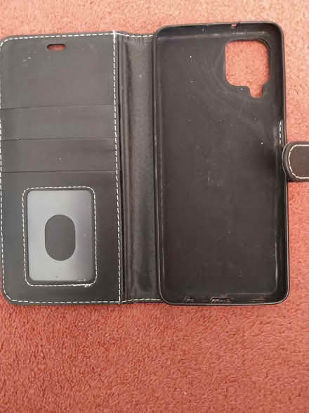 Photo of free Black Leather iPhone Case (B90 shirley) #3