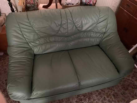 Photo of free 2 seater green leather sofa (Upton Park E6) #1