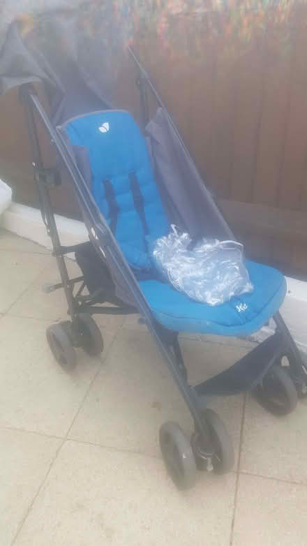 Photo of free Blue Jolie buggy with rain cover. No selling on (Welling DA16) #1