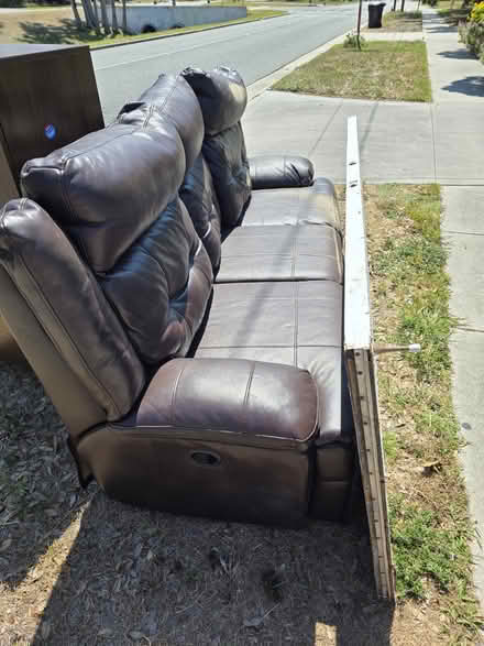 Photo of free Cabinet,wood door, reclining couch (6300 block of 22nd Ave N) #2