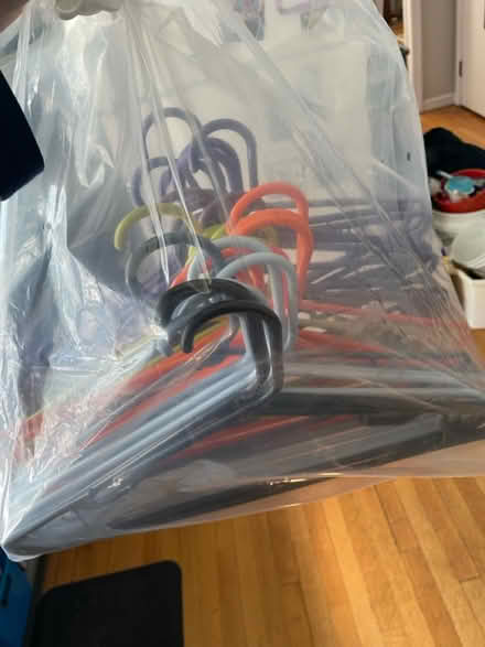 Photo of free Bags of plastic hangers (West Springfield) #1