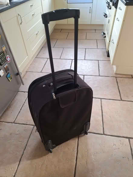 Photo of free Black pull along wheeled suit case (Weston-on-Trent DE72) #1