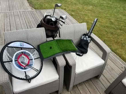 Photo of free Golf clubs, bag, Gold balls and practice mats (Woodley RG5) #1