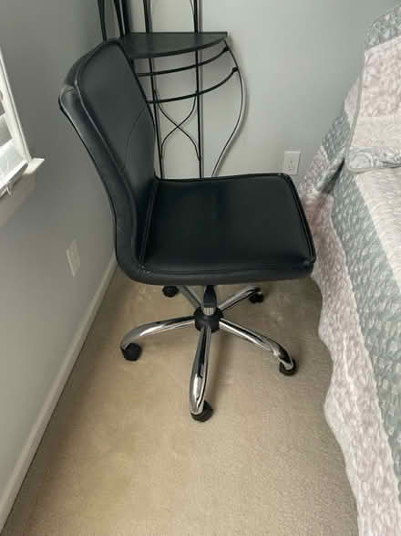 Photo of free Black swivel armless desk chair (South Raleigh) #1