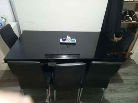 Photo of free Dinning table with 5 chairs. The white part is the packaging (Walton on the Hill L4) #2