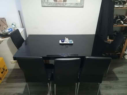 Photo of free Dinning table with 5 chairs. The white part is the packaging (Walton on the Hill L4) #1