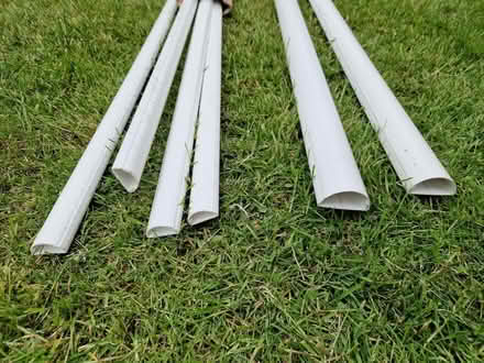 Photo of free D shaped white plastic trunking - two sizes (Arborfield Garrison RG2) #1