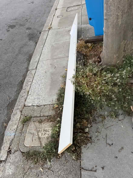 Photo of free long white shelving plywood (3816 22nd street sf) #1