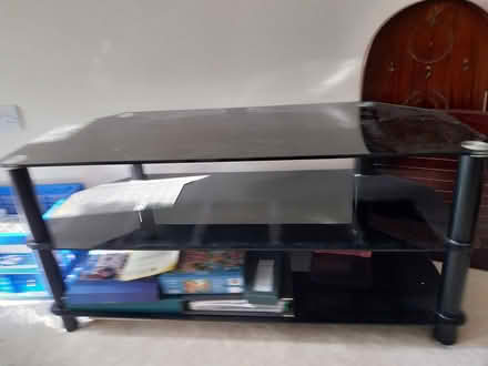 Photo of free Black glass tv unit (Southborough TN4) #2