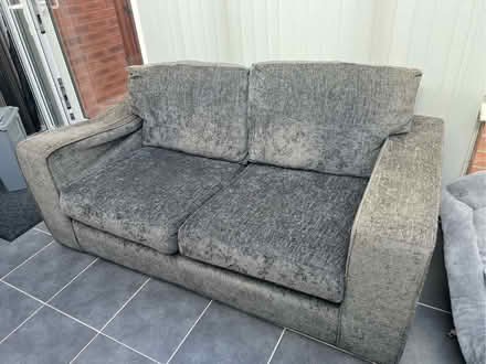 Photo of free Two seater sofa bed grey velour material (Woodville DE11) #1