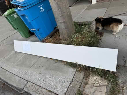 Photo of free long white shelving plywood (3816 22nd street sf) #2