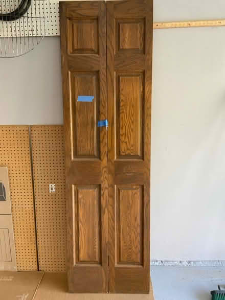 Photo of free 6-panel oak bi-fold closet doors (Darien) #1