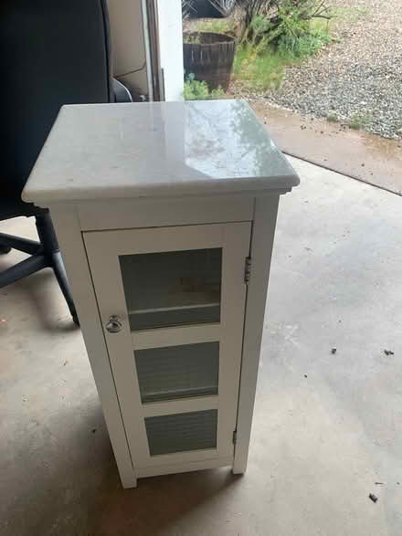Photo of free Marble top cabinet (Off rodeo road) #1